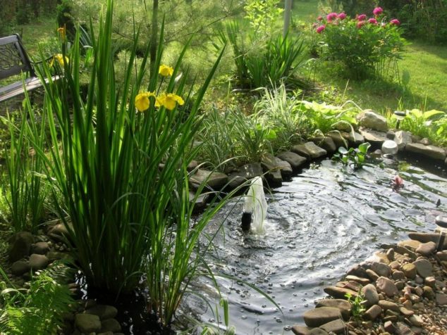 rustic garden with ponds ideas plus fountain the middle pond set on backyard home including metal chair garden in the nearby 634x476 15 Cool Under Ground Garden Pond Ideas for Making Favorite Garden