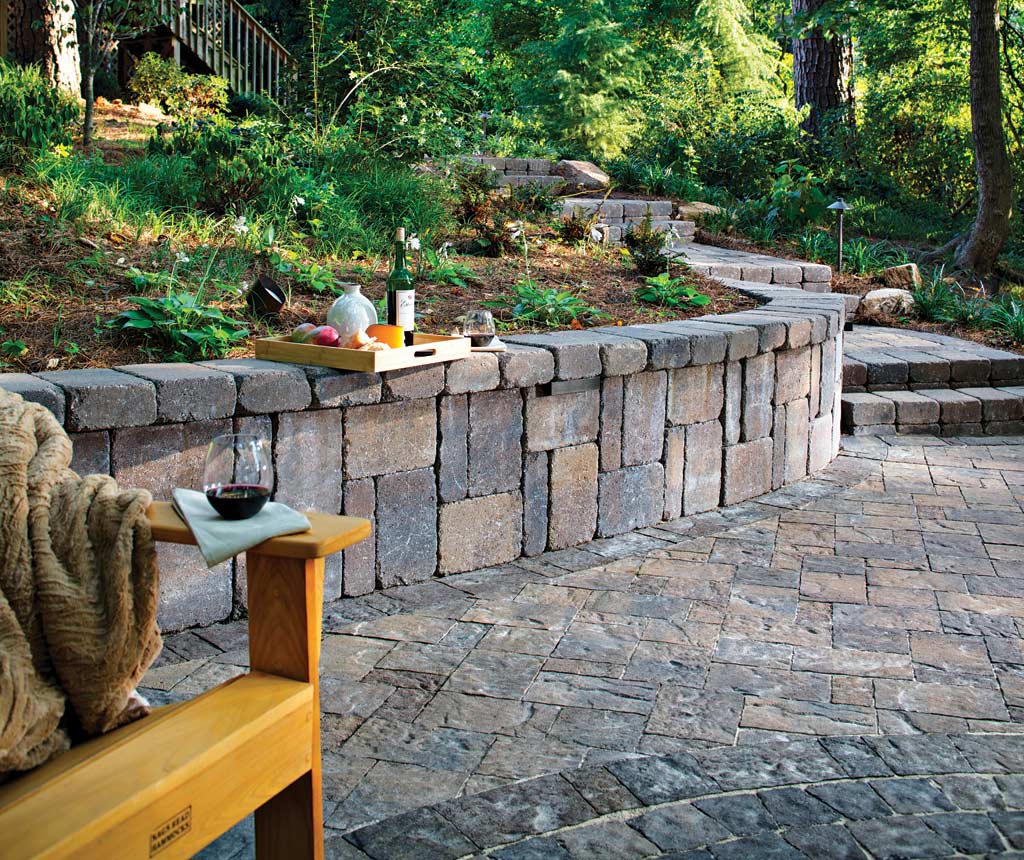 shady-backyard-ideas-stacked-stone-edging-natural-stone-garden-paving