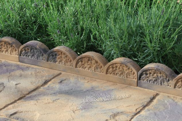 15 Creative Garden Edging Ideas For A Better Outdoor Look yorkstone scalloped garden and path edging 1 hz 634x423 15 Creative Garden Edging Ideas For A Better Outdoor Look