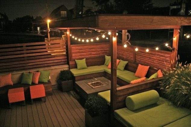10+ Urban DIY Backyard and Patio Lighting Ideas Modern Backyard Ideas with Wooden Deck Using Decorative Outdoor String Lighting and Green Cushion 634x422 10+ Urban DIY Backyard and Patio Lighting Ideas