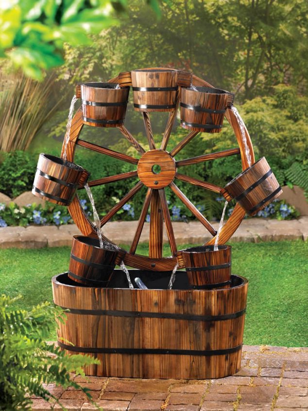 ZT 57070014  16069 634x845 10 DIY Ideas How To Use Wagon Wheel In Garden Decor