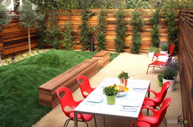 16 Trend setting Fence Panels for Making The Most Out of The Garden a striking wooden backyard fencing with small pine trees also 634x418 16 Trend setting Fence Panels for Making The Most Out of The Garden