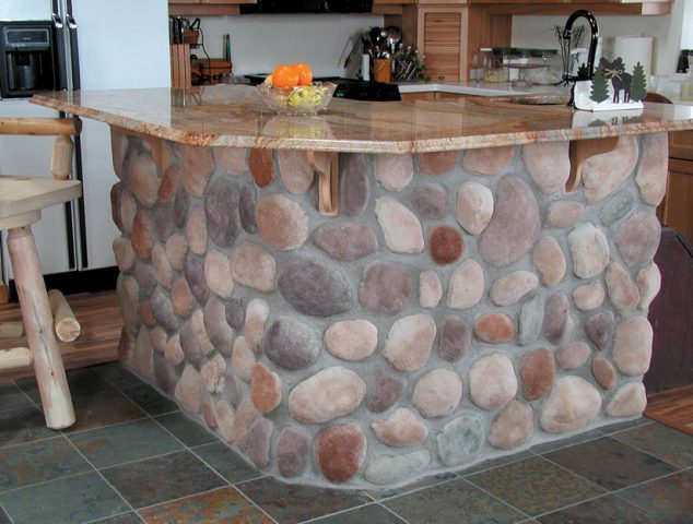 18 Brilliant Uses of River Rocks For Exclusive Home Decoration kitchen island stone veneer 634x480 18 Brilliant Uses of River Rocks For Exclusive Home Decoration