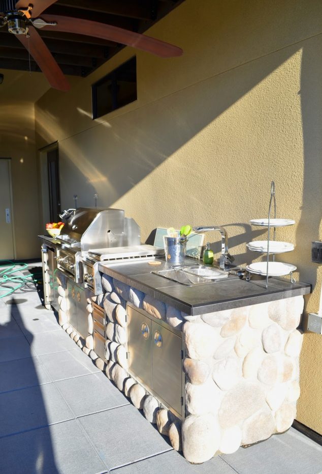 18 Brilliant Uses of River Rocks For Exclusive Home Decoration outdoorkitchenbuiltinprofessionalluxorgrillmadebyModeConcreteinKelownaBC modeconcrete4 634x931 18 Brilliant Uses of River Rocks For Exclusive Home Decoration