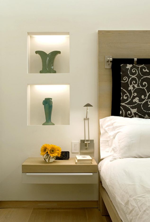 16 Functional and Stylish Shelves Design That Will Grab Your Attention Simply mounting side table and stylish lamp aside the hardwooden bed with black ornate headboard along with lovely niches with decorative green vases and recessed lamps 634x938 16 Functional and Stylish Shelves Design That Will Grab Your Attention