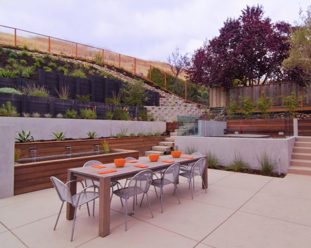 19 Dramatic Terraced Planter Ideas For Creating Landscaping Show parsons dining table Patio Contemporary with concrete glass panel railing outdoor dining patio 634x507 19 Dramatic Terraced Planter Ideas For Creating Landscaping Show
