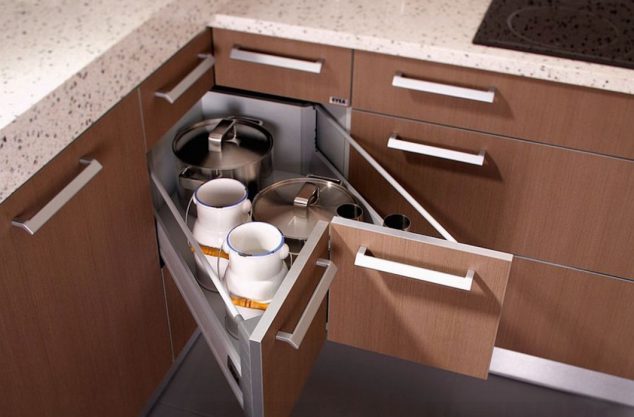 Organization in Kitchen Has Never Been Easier With Corner Kitchen Cabinet butterfly corner drawers in the kitchen help tuck away those extra pots and pans1 634x417 Organization in Kitchen Has Never Been Easier With Corner Kitchen Cabinet