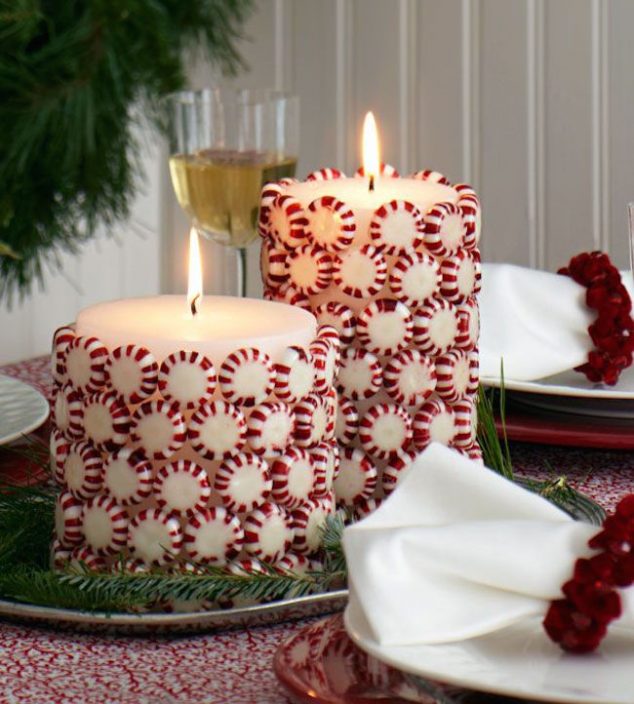 14 DIY Unforgettable Winter Candle Holders That Brings Happiness In The House Christmas candies glued to white pillar candles 634x704 14 DIY Unforgettable Winter Candle Holders That Brings Happiness In The House