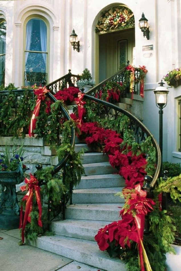 Green Red Garlands Exterior Stairs Decor 634x947 15 Sensational Christmas Front Door Decor With Lovely Red Poinsettias