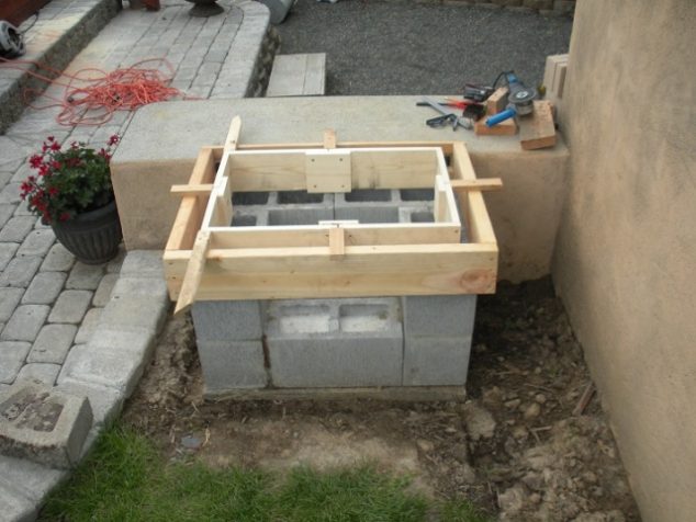DIY Cool Cement Barbecue Grill in Outdoor Space You Could Own it Open Grill 1 634x476 DIY Cool Cement Barbecue Grill in Outdoor Space You Could Own it
