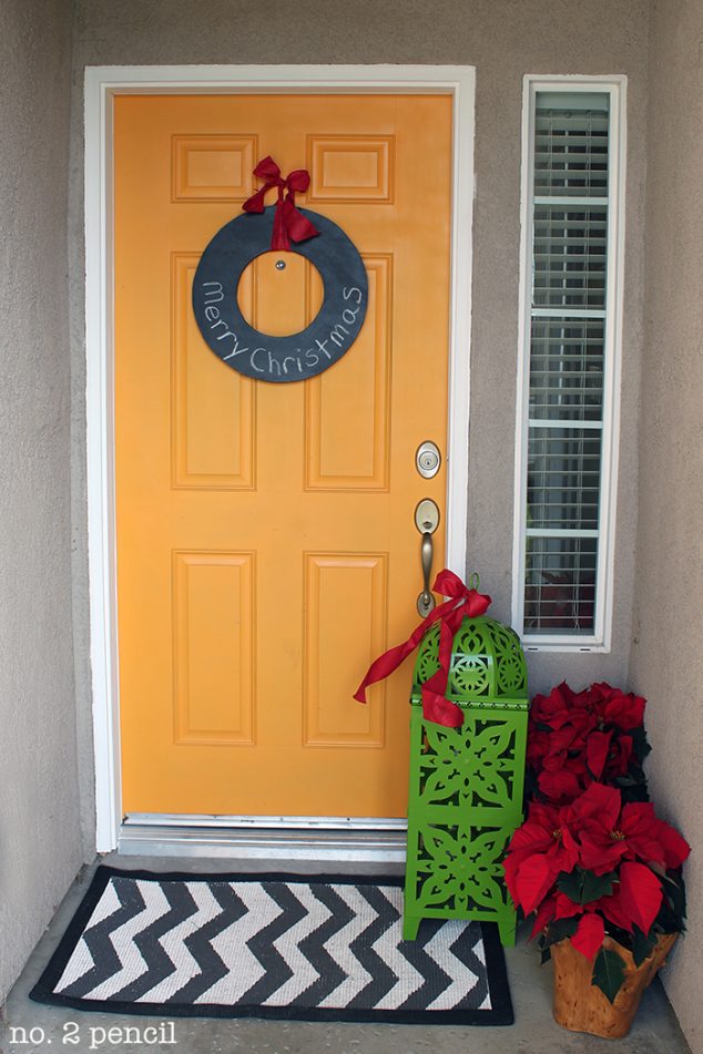 christmas door 634x951 15 Sensational Christmas Front Door Decor With Lovely Red Poinsettias