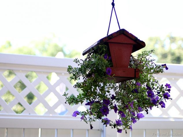 14 Superb Decorative Hanging Flower Pots for DIYers red painted bird feeder becomes hanging flower plainter Petticoat Junktion 634x476 14 Superb Decorative Hanging Flower Pots for DIYers