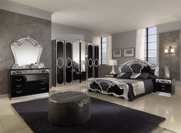15 Dazzling Modern Bedroom Furniture Set to Blow you Away round ottoman idea feats lavish bedroom furniture set design plus modern black area rug and ornately vanity mirror frame 909x665 634x464 15 Dazzling Modern Bedroom Furniture Set to Blow you Away