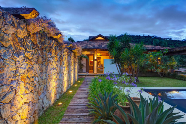 15 Amazing House Fence Design to Leave you Speechless wonderful backyard yellow lighting ideas warm modern rustic house intended for stone and wood fence ideas intended for your own home 15 Amazing House Fence Design to Leave you Speechless