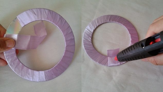 Downloads1 634x357 Reuse the Old CDs To Make Curtain Knot In Creative Way