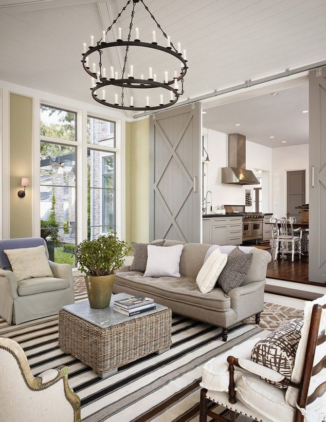 15 Ways in Which You Could Creatively Use Barn Door in Home Farmhouse living room with sliding barn doors 634x822 15 Ways in Which You Could Creatively Use Barn Door in Home