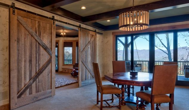 15 Ways in Which You Could Creatively Use Barn Door in Home Mountain dining room area with a cozy decor 634x370 15 Ways in Which You Could Creatively Use Barn Door in Home
