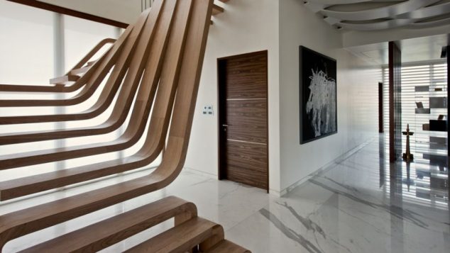 15 Splendid Wooden Staircases You Will Definitely Love 203 Wave Hello to the Flowing Forms of This Stunning Staircase 0 f 634x357 15 Splendid Wooden Staircases You Will Definitely Love