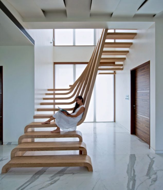 15 Splendid Wooden Staircases You Will Definitely Love 203 Wave Hello to the Flowing Forms of This Stunning Staircase 1 f 634x738 15 Splendid Wooden Staircases You Will Definitely Love