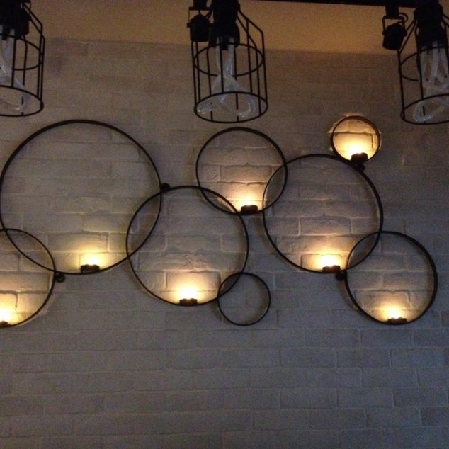 15 Chic Wrought Iron Wall Candle Holders You Will Admire ba879f74289857ee3a3c2e79d4d71479 634x634 15 Chic Wrought Iron Wall Candle Holders You Will Admire