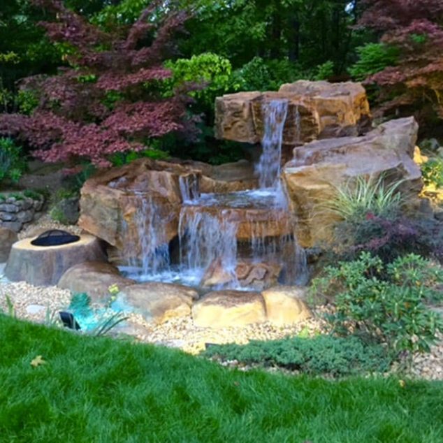 backyard waterfall pond 634x634 The Most Fanciful Backyard Water Features Ideas