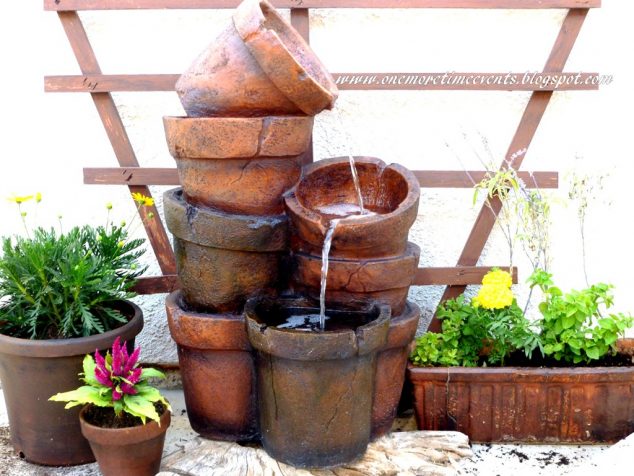 funky fountain 634x476 How to Turn Broken Flower Pots Into Incredible Water Fountain