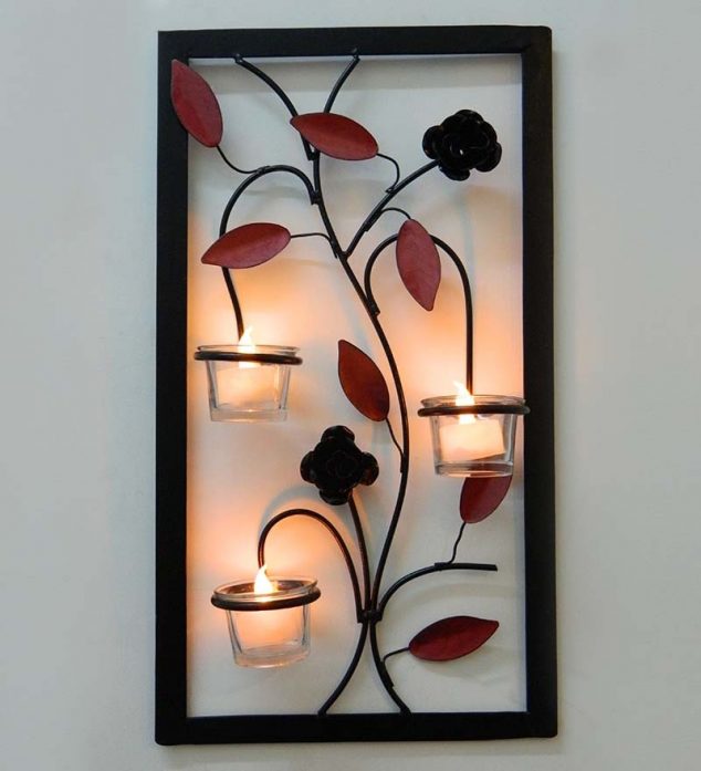 tu casa leaf wall hanging candle holder with wx candle tu casa leaf wall hanging candle holder with zonzmm 634x697 15 Chic Wrought Iron Wall Candle Holders You Will Admire