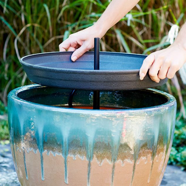 How to Turn Broken Flower Pots Into Incredible Water Fountain two tier patio water fountain 102654436 634x634 How to Turn Broken Flower Pots Into Incredible Water Fountain