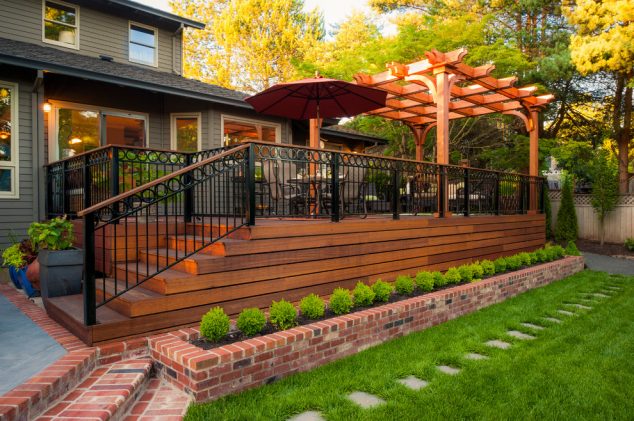 wrought iron pergola Deck Traditional with Arbors brick planter brick 634x421 16 Amazing Outdoor Deck Design That Looks Like Restored Heaven
