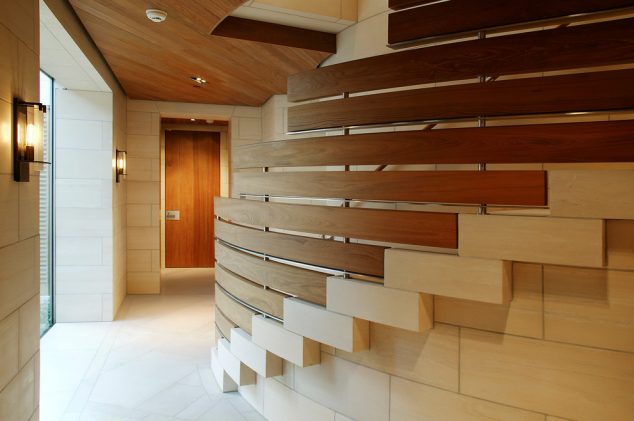 contemporary stair railing Hall Contemporary with beige tile curved staircase 634x421 14 Gorgeous Uses of Wooden Screens Indoor and Outdoor