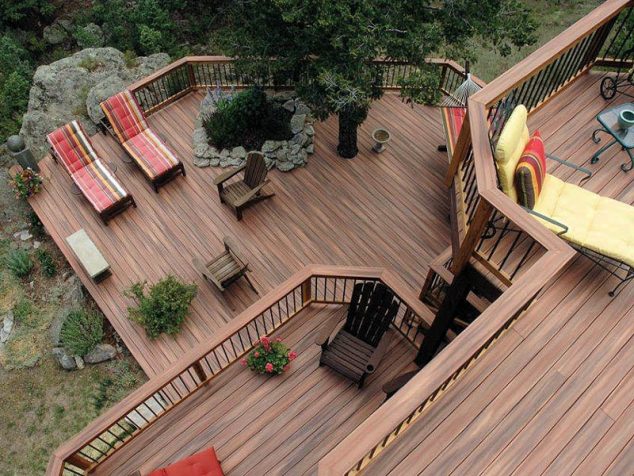 decking ideas for sloping garden 634x476 15 Comfortable Garden Decking for Reading Books