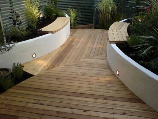 garden decking ideas with narrow subway installed to make it looks larger 634x476 15 Comfortable Garden Decking for Reading Books
