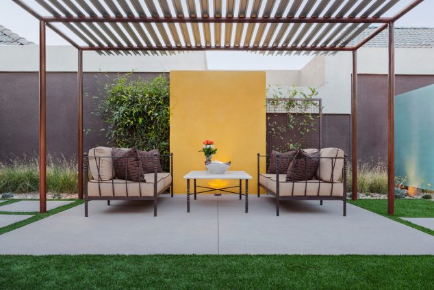 15 Adorable Backyard Seating Areas to Turn Yard Into Peaceful Retreat metal pergola Patio Modern with concrete patio covered patio desert modern desert natives garden wall metal trellis 634x424 15 Adorable Backyard Seating Areas to Turn Yard Into Peaceful Retreat