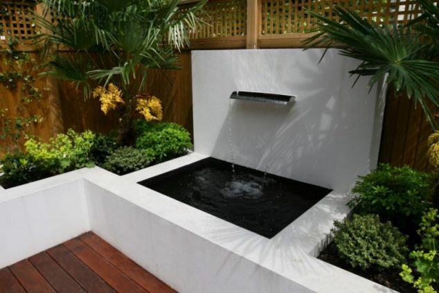 15 Stunning Garden Water Features That Will Leave You Speechless square raised backyard pond ideas mixed with enchanting waterfall also wooden laminate floor and elba fence style 805x537 800x534 634x423 15 Stunning Garden Water Features That Will Leave You Speechless