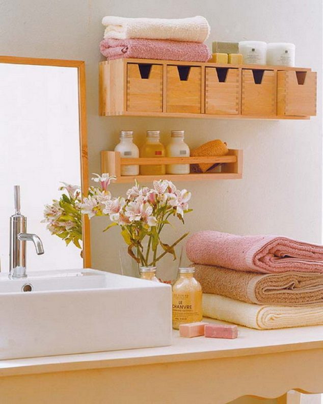 33 Bathroom Storage Hacks and Ideas That Will Enhance Your Home homesthetics 24 634x793 15 of The Most Creative Bathroom Towel Storage