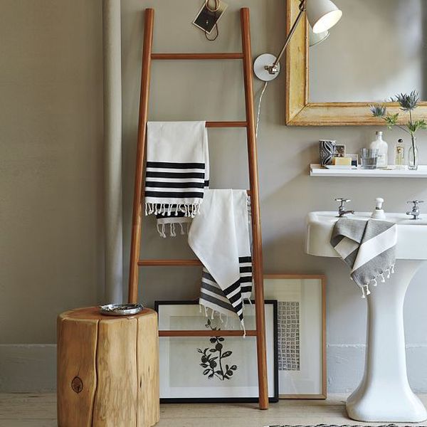 Modern bathroom dominated by organic hues 15 of The Most Creative Bathroom Towel Storage