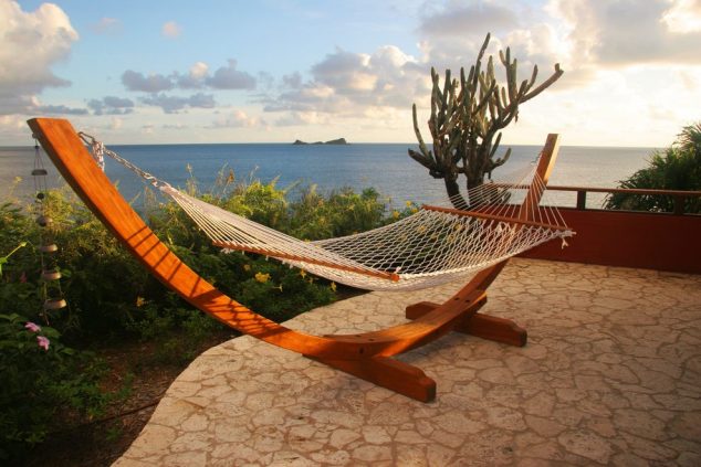 hanging patio hammock patio tropical with waterfront tropical outdoor sofas 634x423 17 Backyard Hammock Ideas Adding Cozy Accent to Outdoor Place