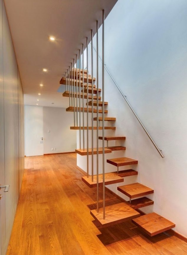15 Eye Catching Stairways to Charm You interior stairs design modern wooden stair design with metal handrail 634x867 15 Eye Catching Stairways to Charm You