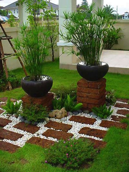 staggered brick pedestals design diy magazine 450x600 Nice Collection of Bricks Garden Ideas
