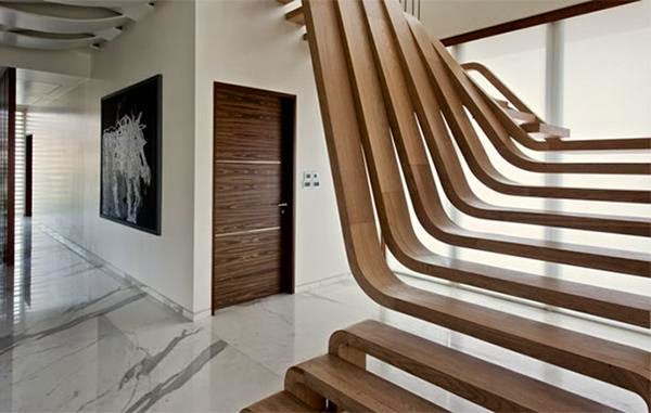 wooden staircase design with streanlined wooden stairs for ultra modern interior 15 Eye Catching Stairways to Charm You