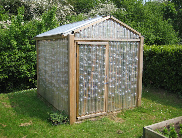 DIY plastic bottle green house 3 1 Amazing Ideas on How to Reuse Plastic Bottles in Garden