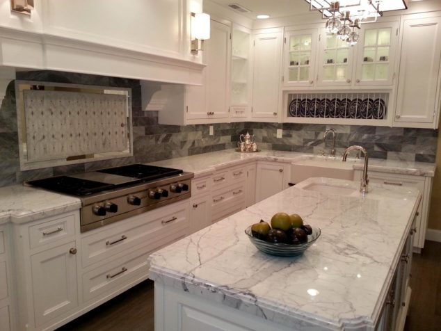 Luxurious Kitchen using White Nuance and Decorated with White Granite Countertops and Glorious Kitchen Backsplash 634x476 15 Impressive Kitchen Colored Counter top to Inspire You