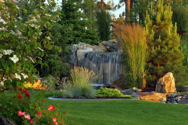 eclectic landscape 634x422 You Really Need a Relaxing Backyard Waterfall