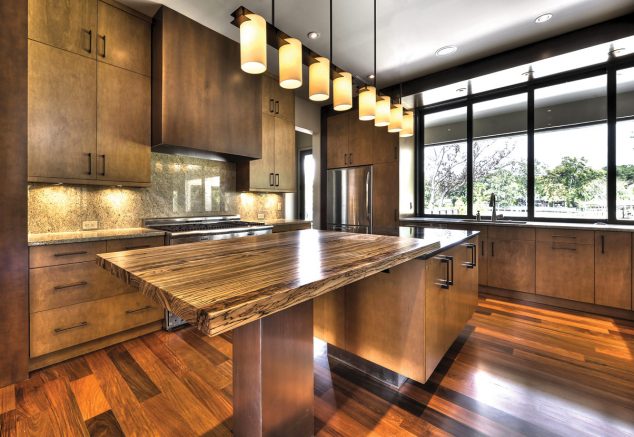 15 Impressive Kitchen Colored Counter top to Inspire You exotic large kitchen design with industrial cabinetry idea and stunning island countertop in inexpensive style beneath candle pendants above bamboo laminated floor 634x437 15 Impressive Kitchen Colored Counter top to Inspire You
