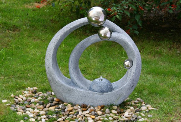 fontaine de jardin design pierre sculpture moderne 14 Outstanding Fountains to Enhance the Backyard
