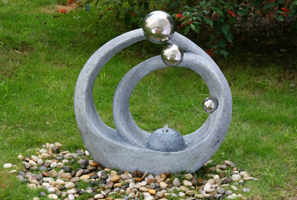 14 Outstanding Fountains to Enhance the Backyard fontaine de jardin design pierre sculpture moderne 14 Outstanding Fountains to Enhance the Backyard