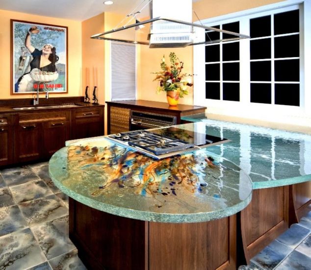 15 Impressive Kitchen Colored Counter top to Inspire You unique kitchen island design with inexpensive glass countertop above wooden storage beneath cool smokestack with modern stove set above tile flooring idea 634x549 15 Impressive Kitchen Colored Counter top to Inspire You